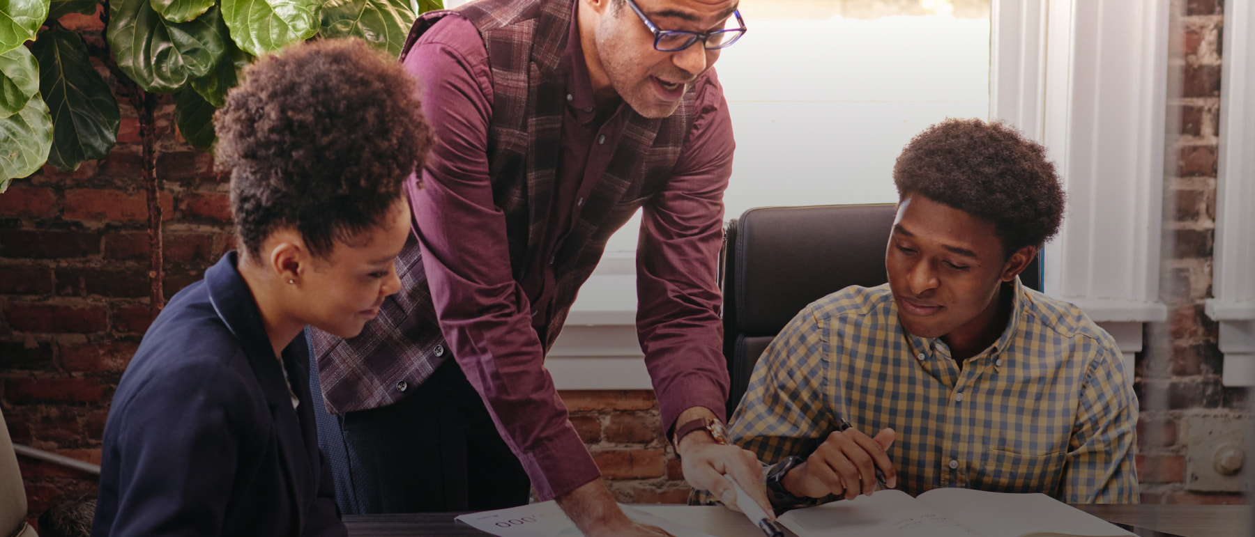 Teacher explaining to his students