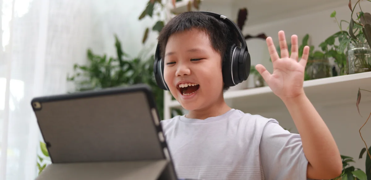 Elementary student attending to an online class at home